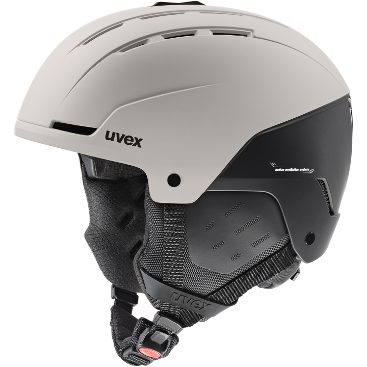 Kask narciarski UVEX Stance hardshell IAS w kolorze beżowo-czarnym, widok z boku. Idealny kask all-mountain.