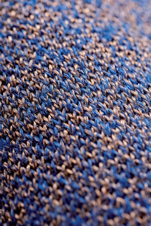 Zbliżenie na materiał skarpet THERM-ic Merino Reflector, widoczna struktura i splot Warm Reflector.