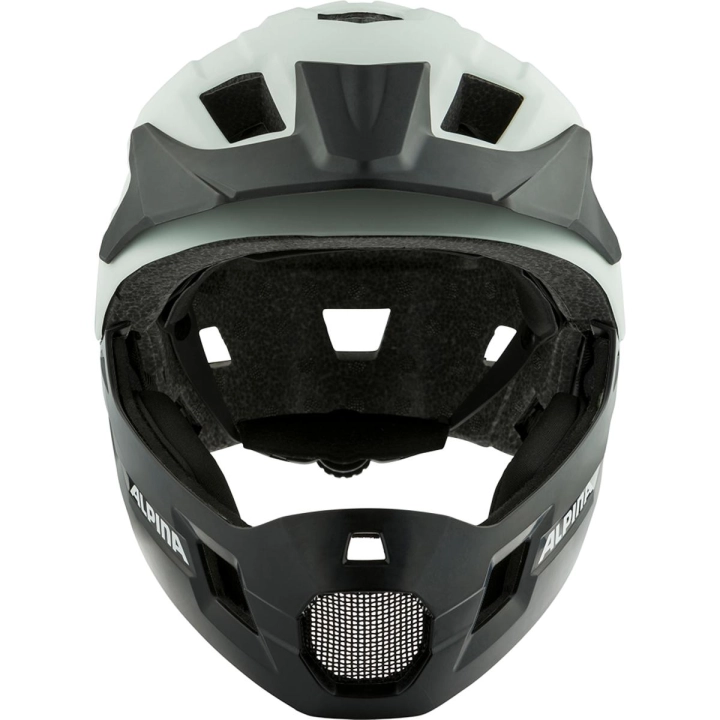 Dziecięcy kask full face ALPINA RUPI Off-White Matt w ujęciu od przodu, ukazujący szeroki otwór na gogle, ochronną osłonę brody oraz profilowany daszek chroniący przed słońcem i gałęziami.