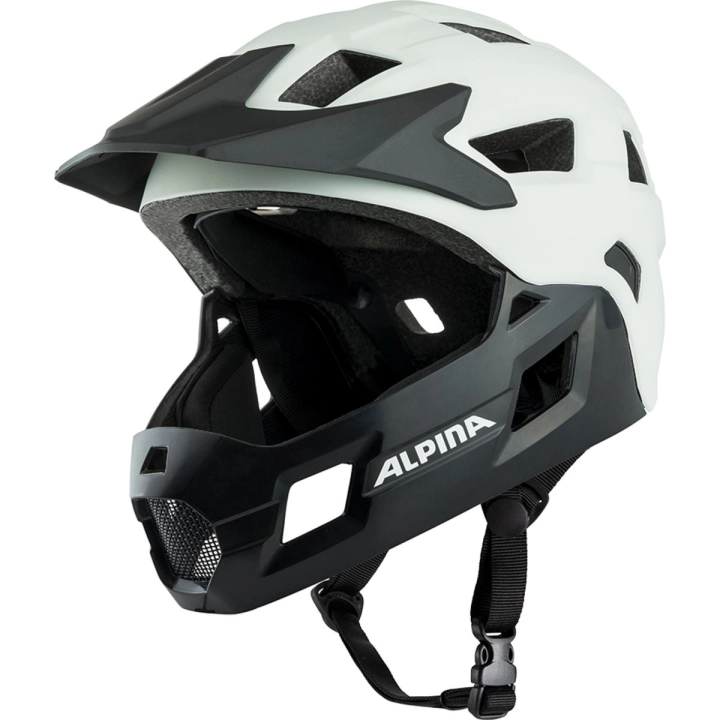 Kask MTB dla dzieci ALPINA RUPI Off-White ujęty pod kątem 3/4, pokazujący elastyczną konstrukcję z odpinaną szczęką oraz paski systemowego zapięcia Ergomatic.